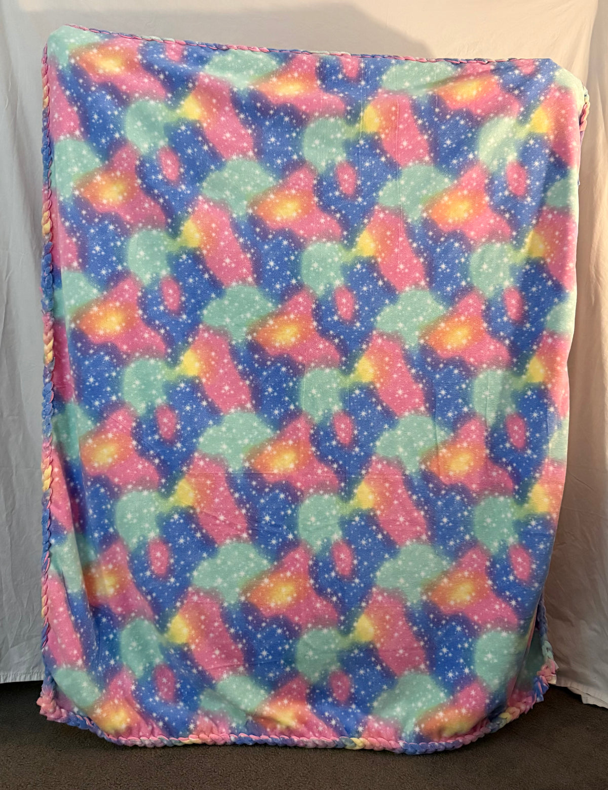 Galaxy cloud print side of fleece blanket